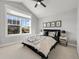 Bedroom has a large window, closet, natural light and modern decor at 1140 S Sherman St, Denver, CO 80210