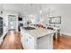 Bright, open-concept kitchen featuring a kitchen island at 1140 S Sherman St, Denver, CO 80210