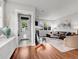 Bright living room features a fireplace, hardwood floors, and comfortable seating at 1140 S Sherman St, Denver, CO 80210