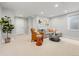 Bright living room featuring neutral walls, stylish furniture, and modern decor elements at 1140 S Sherman St, Denver, CO 80210