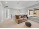 Cozy loft space with a comfortable sofa, stylish lighting, and a large window at 1140 S Sherman St, Denver, CO 80210