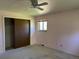 Cozy bedroom with closet and window provides ample light and storage at 1602 S Lamar St, Lakewood, CO 80232