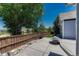 View of the backyard with fence, patio area with fire pit and playground at 12344 Turquoise Terrace St, Castle Pines, CO 80108