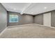 Finished basement with carpet, recessed lights, and a window to the outside at 12344 Turquoise Terrace St, Castle Pines, CO 80108