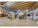 Unfinished basement with exposed ceiling, concrete floor, and plentiful storage space at 12344 Turquoise Terrace St, Castle Pines, CO 80108