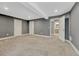 Finished basement features neutral paint, recessed lights, and bathroom access at 12344 Turquoise Terrace St, Castle Pines, CO 80108