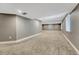 Finished basement features neutral walls, carpet and recessed lighting at 12344 Turquoise Terrace St, Castle Pines, CO 80108