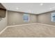 Finished basement with carpet, recessed lighting and windows to the outside at 12344 Turquoise Terrace St, Castle Pines, CO 80108