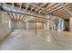 Unfinished basement with concrete walls, bare wood ceiling and mechanical system at 12344 Turquoise Terrace St, Castle Pines, CO 80108