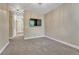 A spacious bedroom with plush carpet, modern lighting and ample natural light at 12344 Turquoise Terrace St, Castle Pines, CO 80108