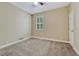 A bright and airy bedroom with a ceiling fan, window shutters and plush carpeting at 12344 Turquoise Terrace St, Castle Pines, CO 80108