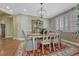 Dining room showcases a classic table set with an ornate china cabinet, perfect for elegant dining at 12344 Turquoise Terrace St, Castle Pines, CO 80108