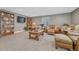Finished basement offers ample living space, bookcases, a large TV, and comfortable seating at 12344 Turquoise Terrace St, Castle Pines, CO 80108