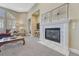 Spacious living room with a decorative fireplace, neutral walls, and a comfortable atmosphere at 12344 Turquoise Terrace St, Castle Pines, CO 80108