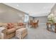 Cozy finished basement features a comfortable seating area and dining space with decorative lamps at 12344 Turquoise Terrace St, Castle Pines, CO 80108