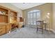 Bright office space featuring a built in desk, neutral walls, plush carpeting and a large window with natural light at 12344 Turquoise Terrace St, Castle Pines, CO 80108