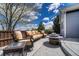 Outdoor patio area with comfortable seating, fire pit, and scenic views, perfect for relaxing and entertaining at 12344 Turquoise Terrace St, Castle Pines, CO 80108