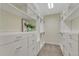 A large walk-in closet with custom shelving and drawers for ample storage space at 12344 Turquoise Terrace St, Castle Pines, CO 80108