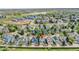Aerial view of community featuring homes with well-kept yards and mature trees at 1011 S Valentia St # 30, Denver, CO 80247