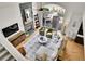 Bright living room boasts fireplace, hardwood floors, and access to a private outdoor patio at 1011 S Valentia St # 30, Denver, CO 80247