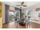 Cozy dining area with seating for four, opening onto an outdoor patio at 5745 S Andes St, Aurora, CO 80015