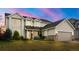 Charming two-story home featuring a well-manicured lawn and an attached two-car garage at 5745 S Andes St, Aurora, CO 80015