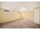 Spacious carpeted basement with neutral paint and a small window at 2526 W 39Th Ave, Denver, CO 80211