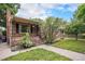 Charming brick home featuring a well-maintained lawn and inviting front porch at 2526 W 39Th Ave, Denver, CO 80211