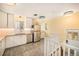 Bright kitchen featuring white cabinets, stainless steel appliances, and wood countertops at 2526 W 39Th Ave, Denver, CO 80211