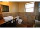 Bathroom features ceramic tile, a contemporary sink, and a glass enclosed shower at 308 Baron Ave, Lafayette, CO 80026