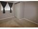 Neutral bedroom offers a closet with a large window for natural light at 308 Baron Ave, Lafayette, CO 80026