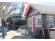 Exterior shot of a charming building offering New Zealand style savory pies with patio and seating at 308 Baron Ave, Lafayette, CO 80026