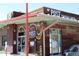 An inviting exterior of The Post Chicken & Beer, with a rustic wood design and signage at 308 Baron Ave, Lafayette, CO 80026