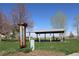 Community park featuring a picnic pavilion, grassy areas, playground and scenic views at 308 Baron Ave, Lafayette, CO 80026