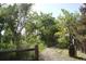 A serene wooded path meanders through lush greenery, offering a peaceful escape at 308 Baron Ave, Lafayette, CO 80026