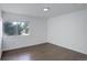 Sunny room with hardwood floors and large window with outdoor views at 5120 Williams Fork Trl # 210, Boulder, CO 80301