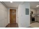 Entryway and hallway with a view into the kitchen at 5120 Williams Fork Trl # 210, Boulder, CO 80301