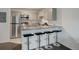 A kitchen showcasing stainless steel appliances, granite countertops, and light gray cabinets at 5120 Williams Fork Trl # 210, Boulder, CO 80301
