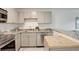 An eat-in kitchen area featuring stainless steel appliances, granite countertops, and an island at 5120 Williams Fork Trl # 210, Boulder, CO 80301