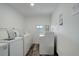 Community laundry room with multiple washing and drying machines at 5120 Williams Fork Trl # 210, Boulder, CO 80301