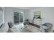 Bright living room featuring sleek furniture, modern decor, and a patio door at 5120 Williams Fork Trl # 210, Boulder, CO 80301