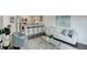 Bright living room featuring sleek furniture, modern decor, and an open floor plan into the kitchen at 5120 Williams Fork Trl # 210, Boulder, CO 80301