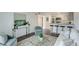 Bright living room featuring sleek furniture, modern decor, and an open floor plan at 5120 Williams Fork Trl # 210, Boulder, CO 80301