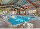 Indoor pool area with vaulted wood ceilings and lots of natural light for all-weather enjoyment at 5120 Williams Fork Trl # 210, Boulder, CO 80301
