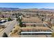 An aerial view showing the building exteriors and surrounding landscape at 13003 W 20Th Ave, Golden, CO 80401