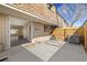 Outdoor patio space features a fenced yard and sliding glass doors to the living area at 13003 W 20Th Ave, Golden, CO 80401