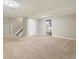 Partially finished basement area with stairs, closet space, and utility hook ups at 13003 W 20Th Ave, Golden, CO 80401