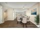Dining room with hardwood floors, modern lighting, and a backyard view at 13003 W 20Th Ave, Golden, CO 80401
