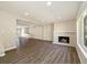 Bright living room with wood floors and a cozy fireplace at 13003 W 20Th Ave, Golden, CO 80401