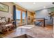 Inviting entryway featuring tile floors, wood accents, and a large window with picturesque views at 40121 County Road 21, Elizabeth, CO 80107
